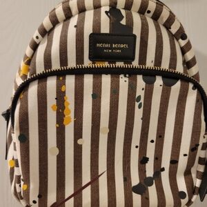 henri bendel Brown & White Striped Backpack with Paint-Splatter Accents